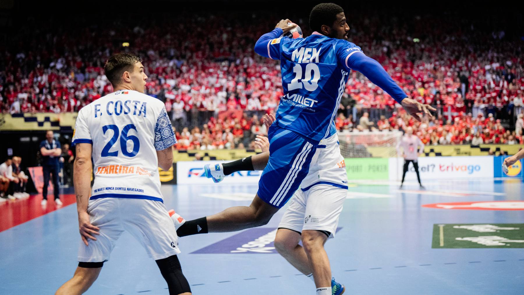 Portugal's Francisco Costa and France's Dika Mem during the EHF Euro 2026 main round European Men's Handball Championship match between France and Portugal in Herning, Saturday, January 24, 2026. (Photo: Sebastian Elias Uth/Ritzau Scanpix)