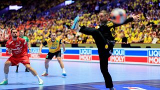 Croatia's right winger #06 Mario Sostaric (L) shoots a penalty during the men's EHF Euro 2026 Group E preliminary round handball match between Sweden and Croatia in Malmo, Sweden, on January 21, 2026.