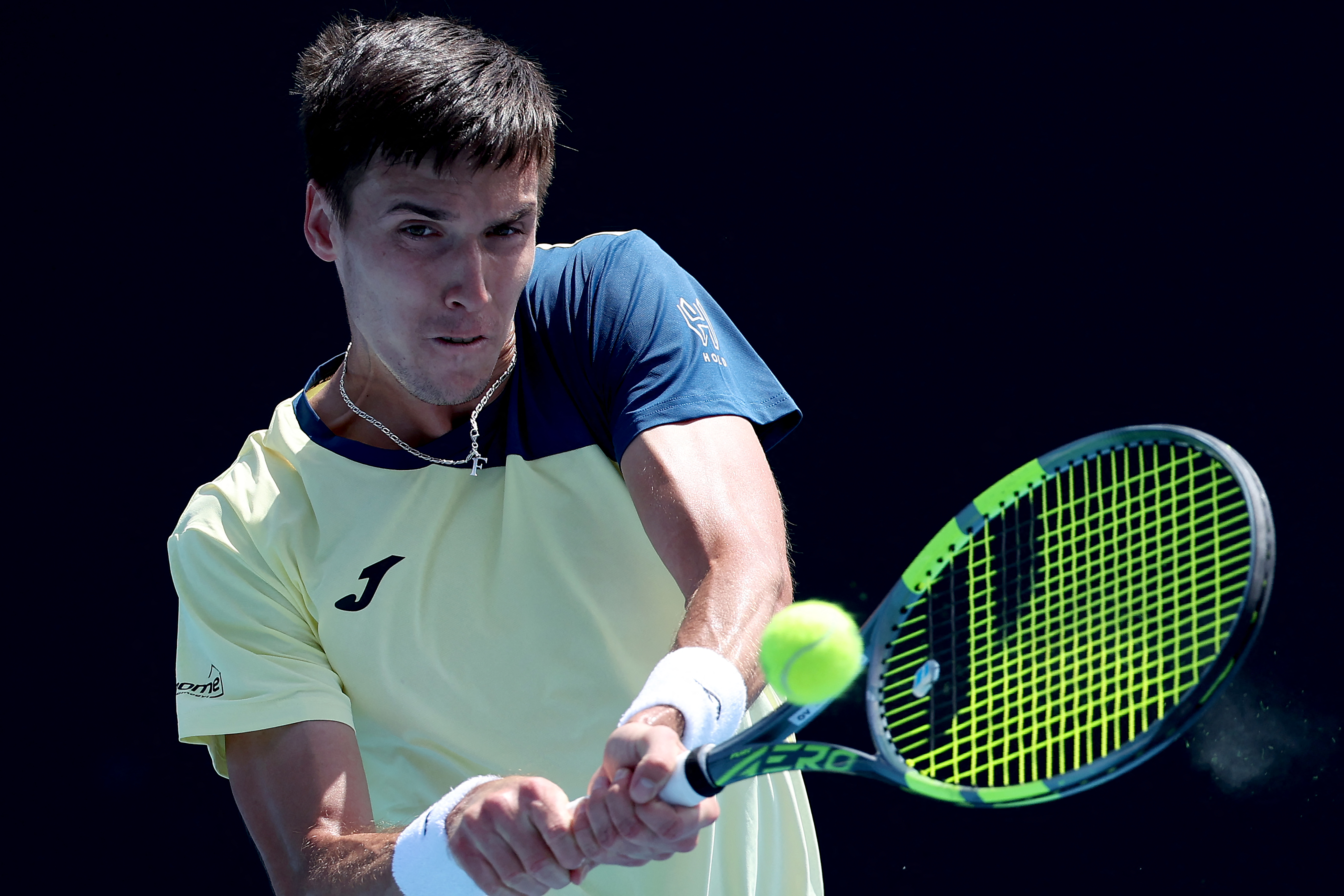 Marozsán Fábián a a lengyel Kamil Majchrzak elleni mérkőzésén az Australian Openen.