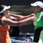 USA's Jessica Pegula (L) and USA's Madison Keys embrace after their women's singles match on day nine of the Australian Open tennis tournament in Melbourne on January 26, 2026.