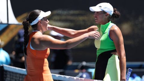USA's Jessica Pegula (L) and USA's Madison Keys embrace after their women's singles match on day nine of the Australian Open tennis tournament in Melbourne on January 26, 2026.