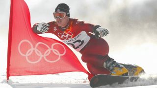 14 Feb 2002: Ryan Wedding of Canada competes in the qualifying round of the men's parallel giant slalom snowboarding event during the Salt Lake City Winter Olympic Games at the Park City Mountain Resort in Park City, Utah. DIGITAL IMAGE. Mandatory Credit: