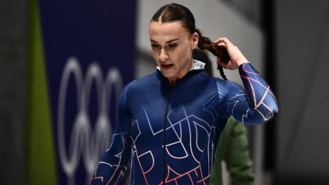 Britain's Adele Nicoll reacts after competing in the bobsleigh women's monobob heat 4 at Cortina Sliding Centre during the Milano Cortina 2026 Winter Olympic Games in Cortina d'Ampezzo on February 16, 2026.