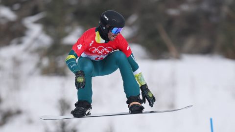 Cameron Bolton of Team Australia performs a trick during the Men's Snowboard Cross Qualification on Day 6 of the Beijing 2022 Winter Olympics at Genting Snow Park on February 10, 2022 in Zhangjiakou, China. (Photo by Matthias Hangst/Getty Images)