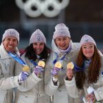 Gold medallists France's Eric Perrot, France's Quentin Fillon Maillet, France's Lou Jeanmonnot, France's Julia Simon pose on the podium of the mixed biathlon 4 x 6km relay event during the Milano Cortina 2026 Winter Olympic Games at the Anterselva Biathlon Arena (Sudtirol Arena) in Anterselva (Val Pusteria) on February 8, 2026.