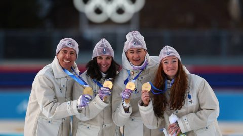 Gold medallists France's Eric Perrot, France's Quentin Fillon Maillet, France's Lou Jeanmonnot, France's Julia Simon pose on the podium of the mixed biathlon 4 x 6km relay event during the Milano Cortina 2026 Winter Olympic Games at the Anterselva Biathlon Arena (Sudtirol Arena) in Anterselva (Val Pusteria) on February 8, 2026.