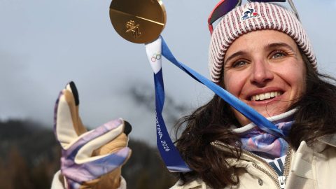 Gold medallist France's Julia Simon poses after the victory ceremony of the women's biathlon 15km individual event during the Milano Cortina 2026 Winter Olympic Games at the Anterselva Biathlon Arena (Sudtirol Arena) in Anterselva (Val Pusteria) on February 11, 2026.