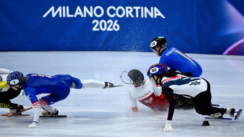 (L-R) USA's Kristen Santos-Griswold, Poland's Kamila Sellier and Italy's Arianna Fontana fall next to South Korea's Noh Do-hee while competing in the short track speed skating women's 1500m quarter-final during the Milano Cortina 2026 Winter Olympic Games at Milano Ice Skating Arena in Milan on February 20, 2026.