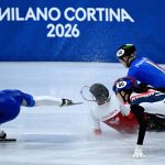 (L-R) USA's Kristen Santos-Griswold, Poland's Kamila Sellier and Italy's Arianna Fontana fall next to South Korea's Noh Do-hee while competing in the short track speed skating women's 1500m quarter-final during the Milano Cortina 2026 Winter Olympic Games at Milano Ice Skating Arena in Milan on February 20, 2026.