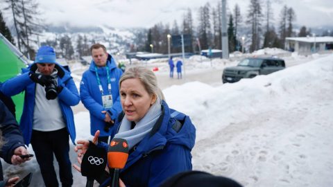 President of the International Olympic Committee (IOC) Kirsty Coventry speaks to the press after Ukraine's Vladyslav Heraskevych was disqualified from the Milano Cortina 2026 Winter Olympic Games in Cortina d'Ampezzo on February 12, 2026. Ukrainian skeleton racer Vladyslav Heraskevych was disqualified from the Winter Olympics on February 12, 2026 after refusing to back down over his banned helmet, which depicts victims of his country's war with Russia. In a statement, the International Olympic Committee said Heraskevych is "not allowed to participate at Milano-Cortina 2026 after refusing to adhere to the IOC athlete expression guidelines". Odd ANDERSEN / AFP