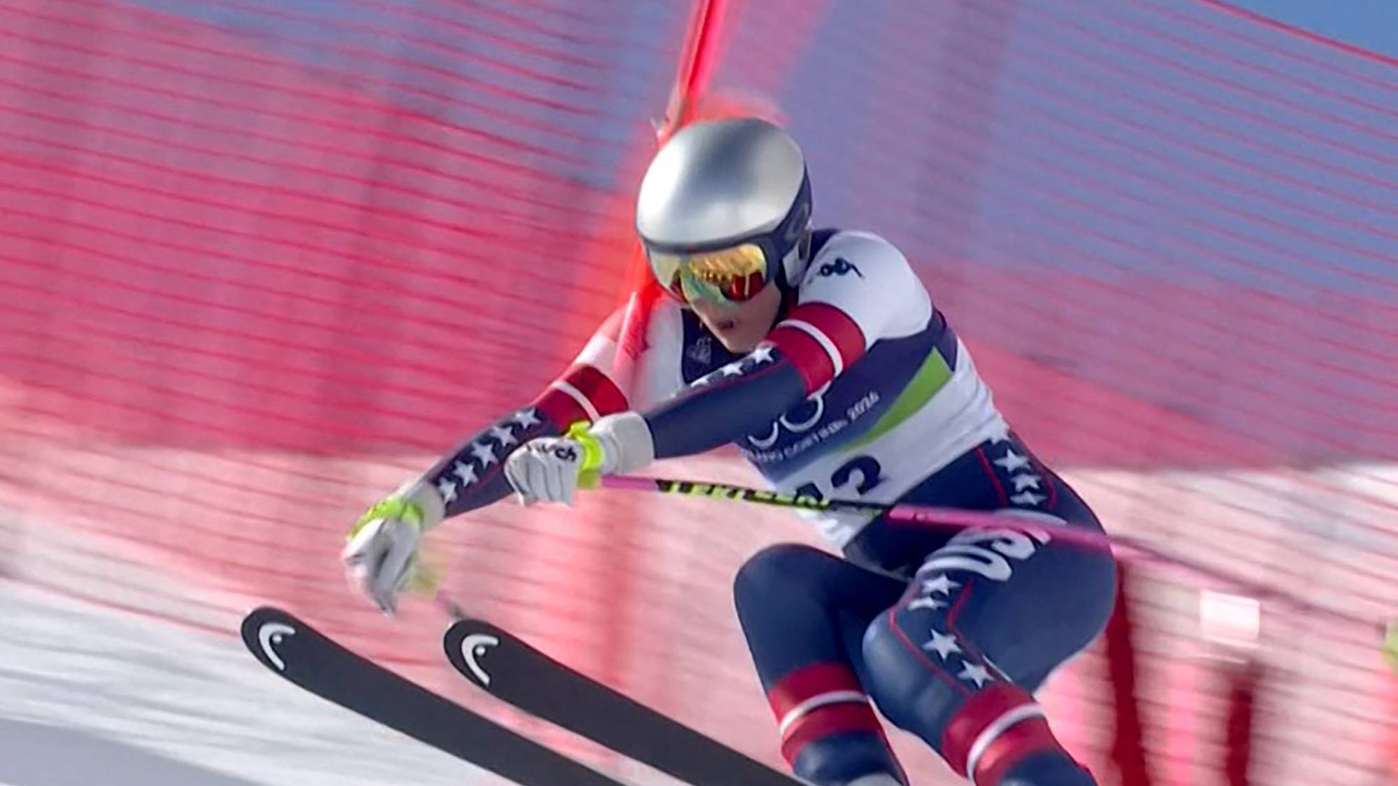 This handout video grab from IOC/OBS shows US Lindsey Vonn crashing during the women's downhill event at the Milano Cortina 2026 Winter Olympic Games in Cortina d’Ampezzo on February 8, 2026.