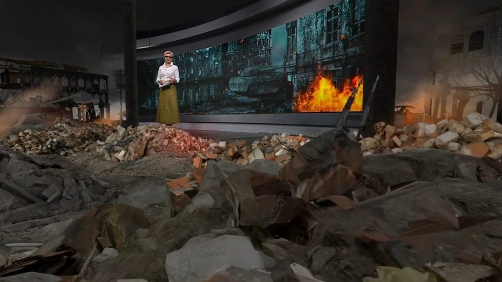 Virtuális lángokkal és rommá lőtt utcákkal indított új háborús propagandaműsort a közmédia