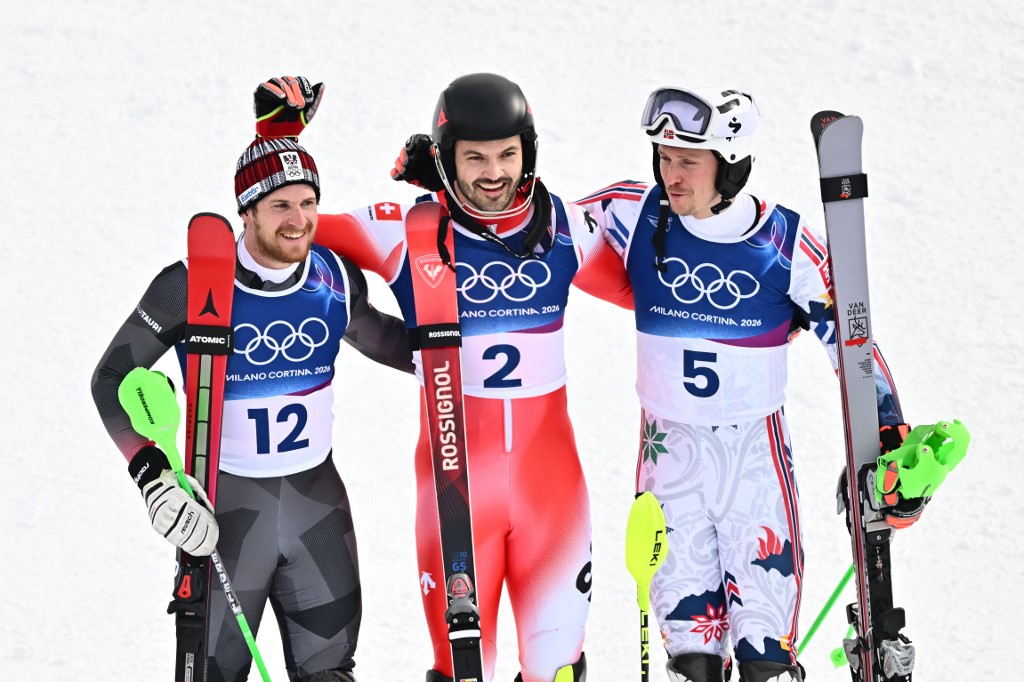 A téli olimpia műlesikló számának dobogósai. 
