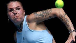 Ukraine’s Oleksandra Oliynykova hits a return to USA's Madison Keys during their women's singles match on day three of the Australian Open tennis tournament in Melbourne on January 20, 2026.