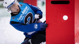 A player throws a snowball during the Showa-shinzan International Yukigassen snowball fight competition in Sobetsu, Hokkaido prefecture on February 21, 2026. At the foot of an active volcano in northern Japan, shouts ring out, competitors size each other up and snowballs whistle through the air in a very serious game of "yukigassen" -- a sport with Olympic dreams.