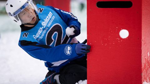A player throws a snowball during the Showa-shinzan International Yukigassen snowball fight competition in Sobetsu, Hokkaido prefecture on February 21, 2026. At the foot of an active volcano in northern Japan, shouts ring out, competitors size each other up and snowballs whistle through the air in a very serious game of "yukigassen" -- a sport with Olympic dreams.