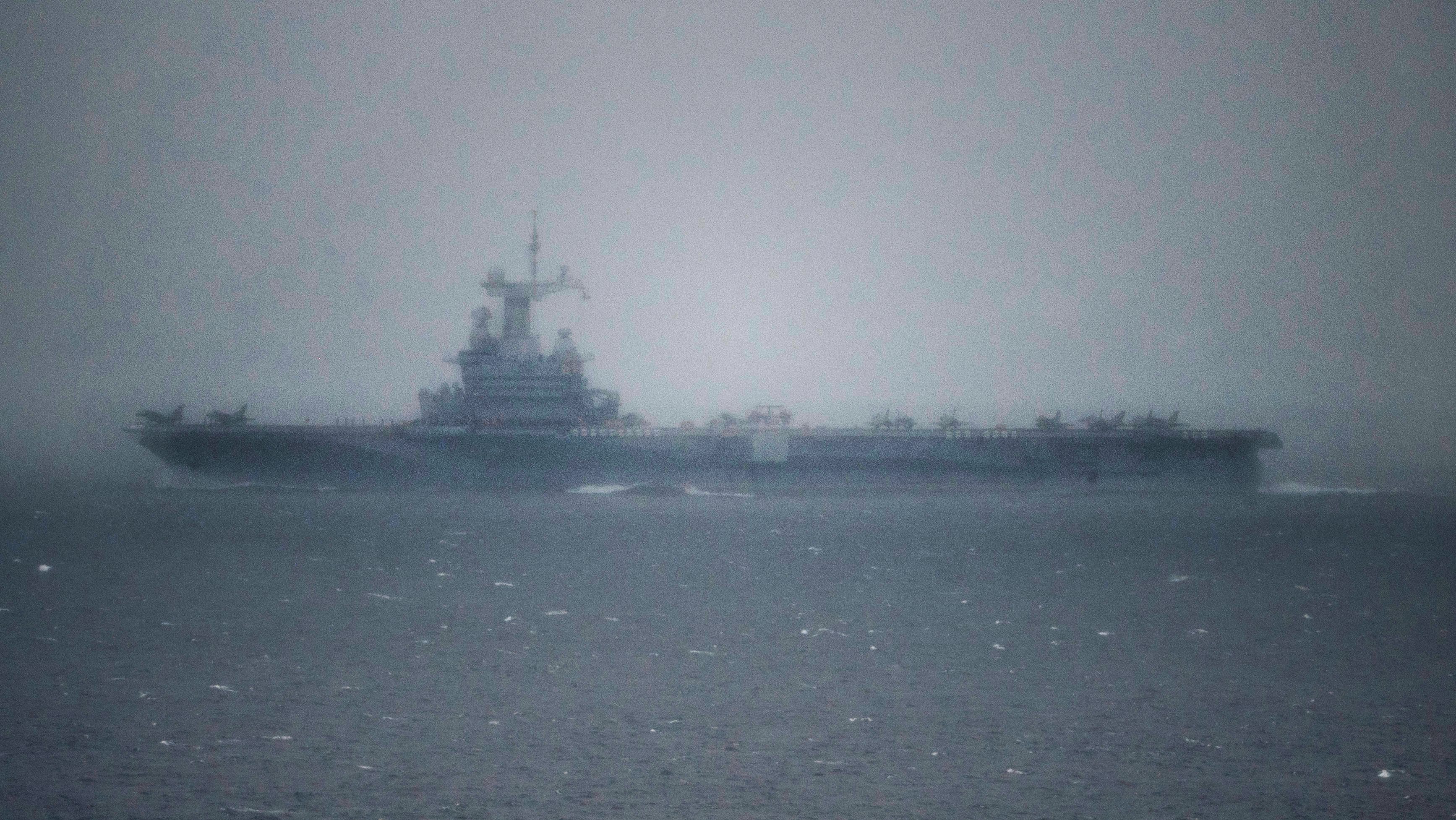 The French aircraft carrier Charles-de-Gaulle is seen as it passes through the Strait of Gibraltar off the coast of southern Spain in Tarifa, on March 6, 2026.