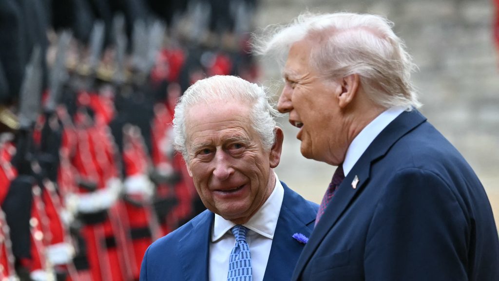 Britain's King Charles III (L) and US President Donald Trump (R) talk