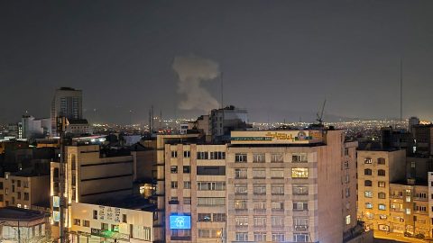 TEHRAN, IRAN - MARCH 22: Smoke rise after explosions as the Israeli army announced a new wave of attacks on Tehran, the capital of Iran, on March 22, 2026. Tolga Akbaba / Anadolu (Photo by Tolga Akbaba / Anadolu via AFP)