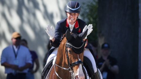 07 September 2023, North Rhine-Westphalia, Riesenbeck: Equestrian sport: European Championship, Dressage, Grand Prix, 2nd half of the starting field (team decision). British dressage rider Charlotte Dujardin rides her horse Imhotep and cheers after her test. Photo: Friso Gentsch/dpa