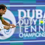 Russia’s Daniil Medvedev returns a shot during his men’s singles semi-final match against Canada's Felix Auger-Aliassime at the Dubai Duty Free Tennis tournament in Dubai on February 27, 2026.