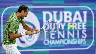 Russia’s Daniil Medvedev returns a shot during his men’s singles semi-final match against Canada's Felix Auger-Aliassime at the Dubai Duty Free Tennis tournament in Dubai on February 27, 2026.