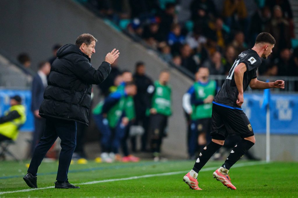 Kosovo's German head coach Franco Foda (L) gestures from the techincal area during the FIFA World Cup 2026 Group B European qualification football match between Slovenia and Kosovo at the Stozice Stadium in Ljubljana, on November 15, 2025.