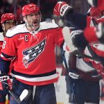 WASHINGTON, DC - MARCH 22: Alex Ovechkin #8 of the Washington Capitals celebrates with teammates after scoring in the third period against the Colorado Avalanche at Capital One Arena on March 22, 2026 in Washington, DC. The goal was Ovechkin's 923rd regular season goal and 1000th career goal including the regular season and playoffs. Greg Fiume/Getty Images/AFP