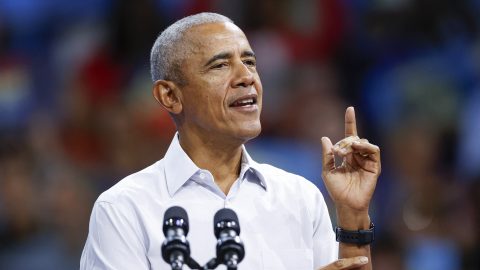 Former US President Barack Obama gestures as he speaks at a campaign rally with Minnesota Governor and Democratic vice presidential candidate Tim Walz in support of Vice President and Democratic presidential candidate Kamala Harris at Alliant Center in Madison, Wisconsin, on October 22, 2024. (Photo by KAMIL KRZACZYNSKI / AFP)