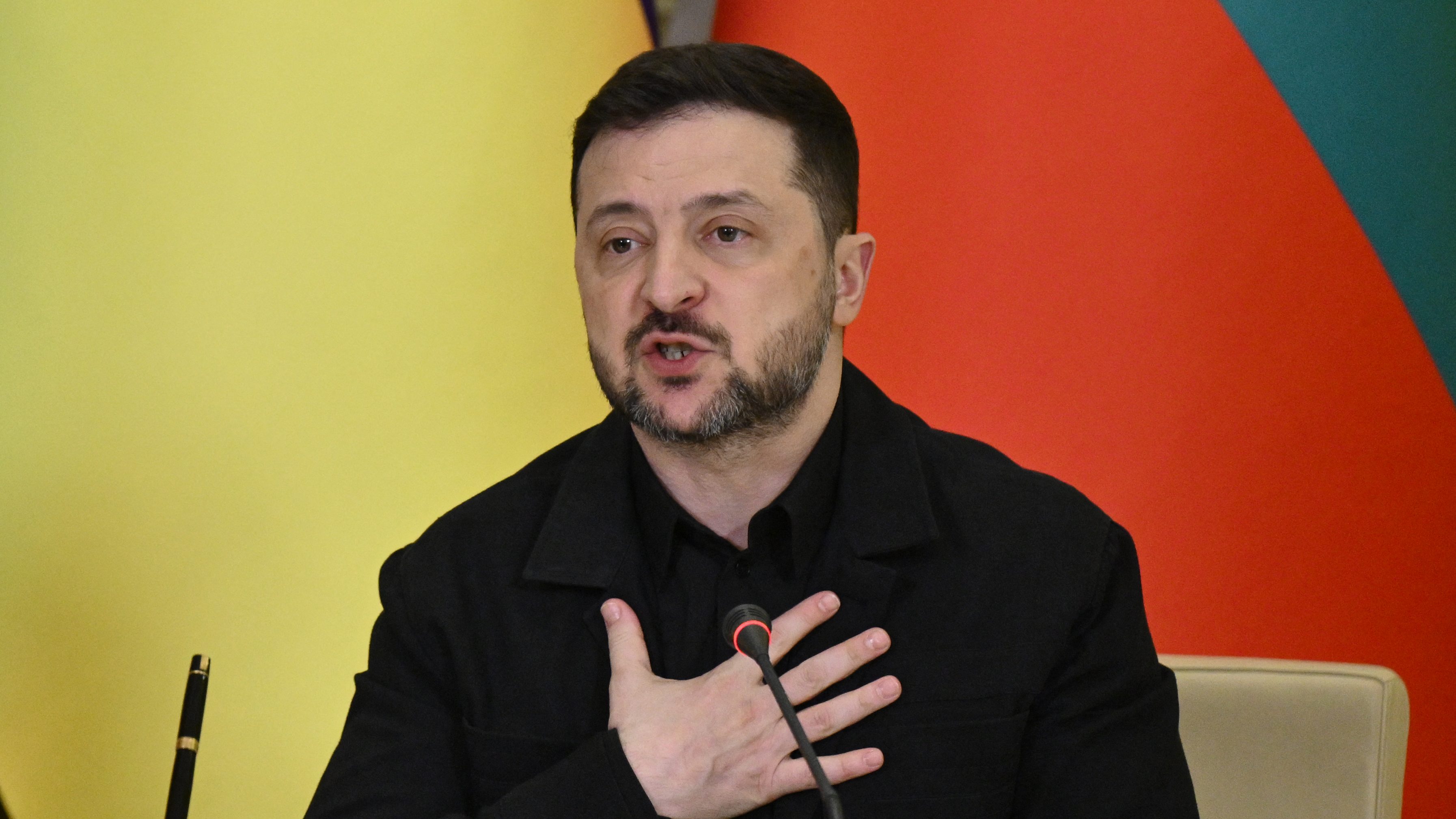 Ukrainian President Volodymyr Zelensky speaks during a joint press conference with Bulgarian Prime Minister following their meeting in Kyiv on March 30, 2026, amid the Russian invasion of Ukraine. (Photo by Genya SAVILOV / AFP)