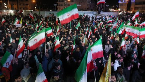 Iranians react after a ceasefire announcement at the Enqelab square, in Tehran, on April 8 2026. The United States and Iran agreed to a two-week ceasefire Tuesday barely an hour before US President Donald Trump's deadline to obliterate the rival country was set to expire, with Tehran to temporarily reopen the vital Strait of Hormuz. (Photo by AFP) /