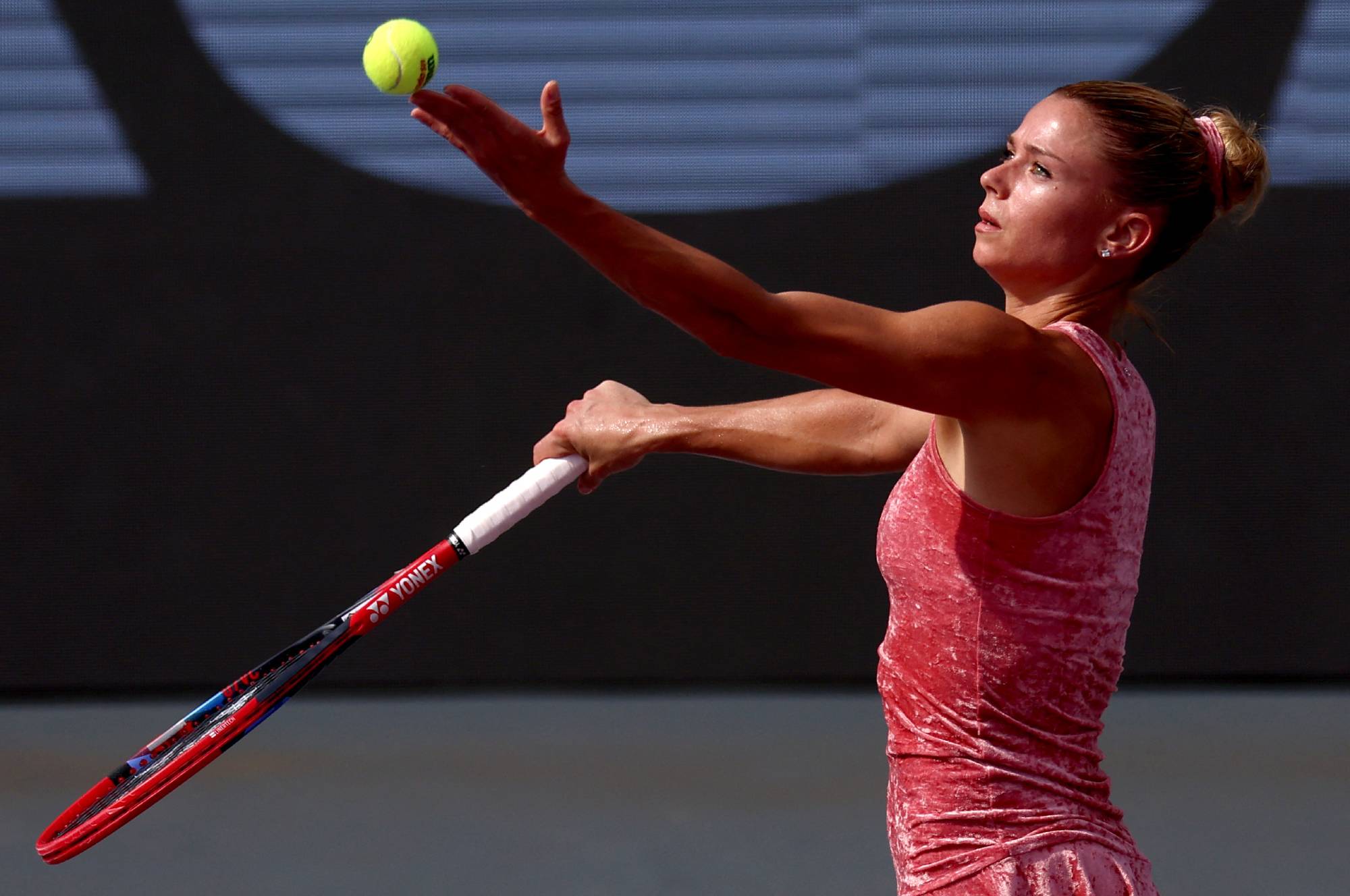 Italy's Camila Giorgi serves against Greece's Maria Sakkari during their women's singles tennis match of the WTA Guadalajara Open in Zapopan, Mexico, on September 20, 2023.