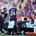 JEDDAH, SAUDI ARABIA - APRIL 17: Jairo of Johor Darul Ta'zim (obscured) receives medical treatment during the AFC Champions League Quarter Final match between Al Ahli and Johor Darul Ta'zim at King Abdullah Sports City on April 17, 2026 in Jeddah, Saudi Arabia. (Photo by Abdullah Ahmed/Getty Images)