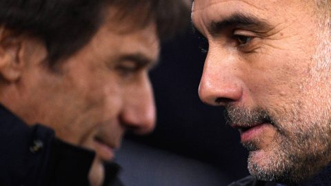 Tottenham Hotspur's Italian head coach Antonio Conte (L) is greeted by Manchester City's Spanish manager Pep Guardiola ahead of the English Premier League football match between Manchester City and Tottenham Hotspur at the Etihad Stadium in Manchester, north west England, on January 19, 2023.