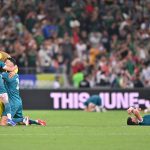 Az iraki játékosok ünnepelnek.