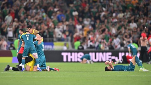 Az iraki játékosok ünnepelnek.