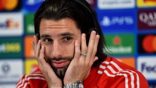 Liverpool's Hungarian midfielder #08 Dominik Szoboszlai attends a press conference at Anfield stadium in Liverpool, north-west England on April 13, 2026, on the eve of their UEFA Champions League, quarter final second leg football match against Paris Saint-Germain.