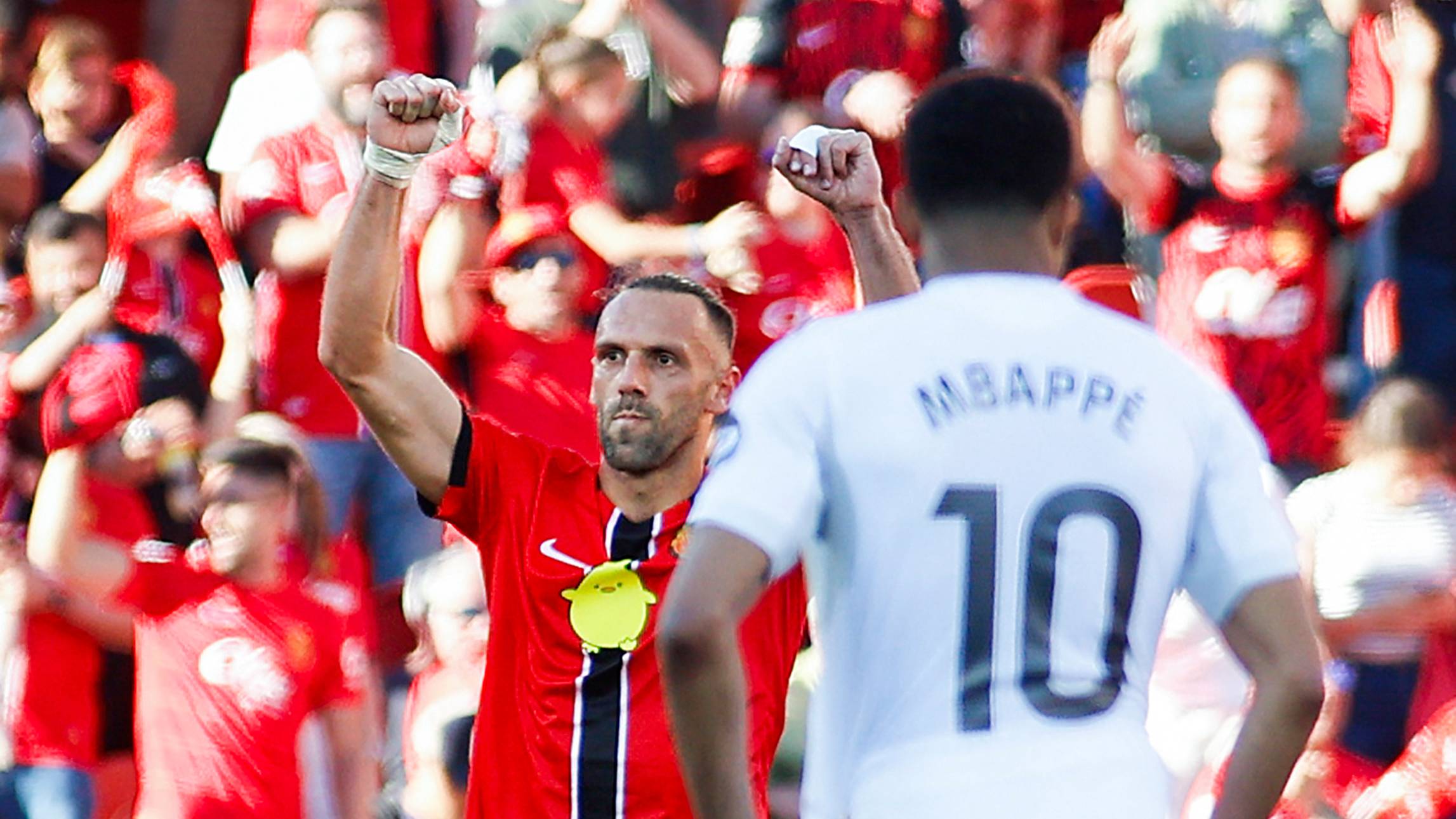 Real Mallorca's Kosovo forward #07 Vedat Muriqi celebrates scoring his team's second goal during the Spanish league football match between RCD Mallorca and Real Madrid CF at Mallorca Son Moix Stadium in Palma de Mallorca on April 4, 2026.