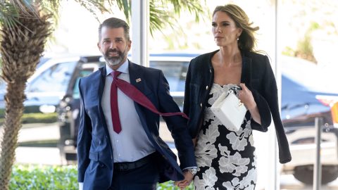 (L/R) Donald Trump Jr. and his fiancee Bettina Anderson arrive to attend the wedding of Dan Scavino, White House Deputy Chief of Staff, and Erin Elmore, the Department of State Director of Art in Embassies, at Mar-a-Lago in Palm Beach, Florida, February 1, 2026. (Photo by SAUL LOEB / AFP)