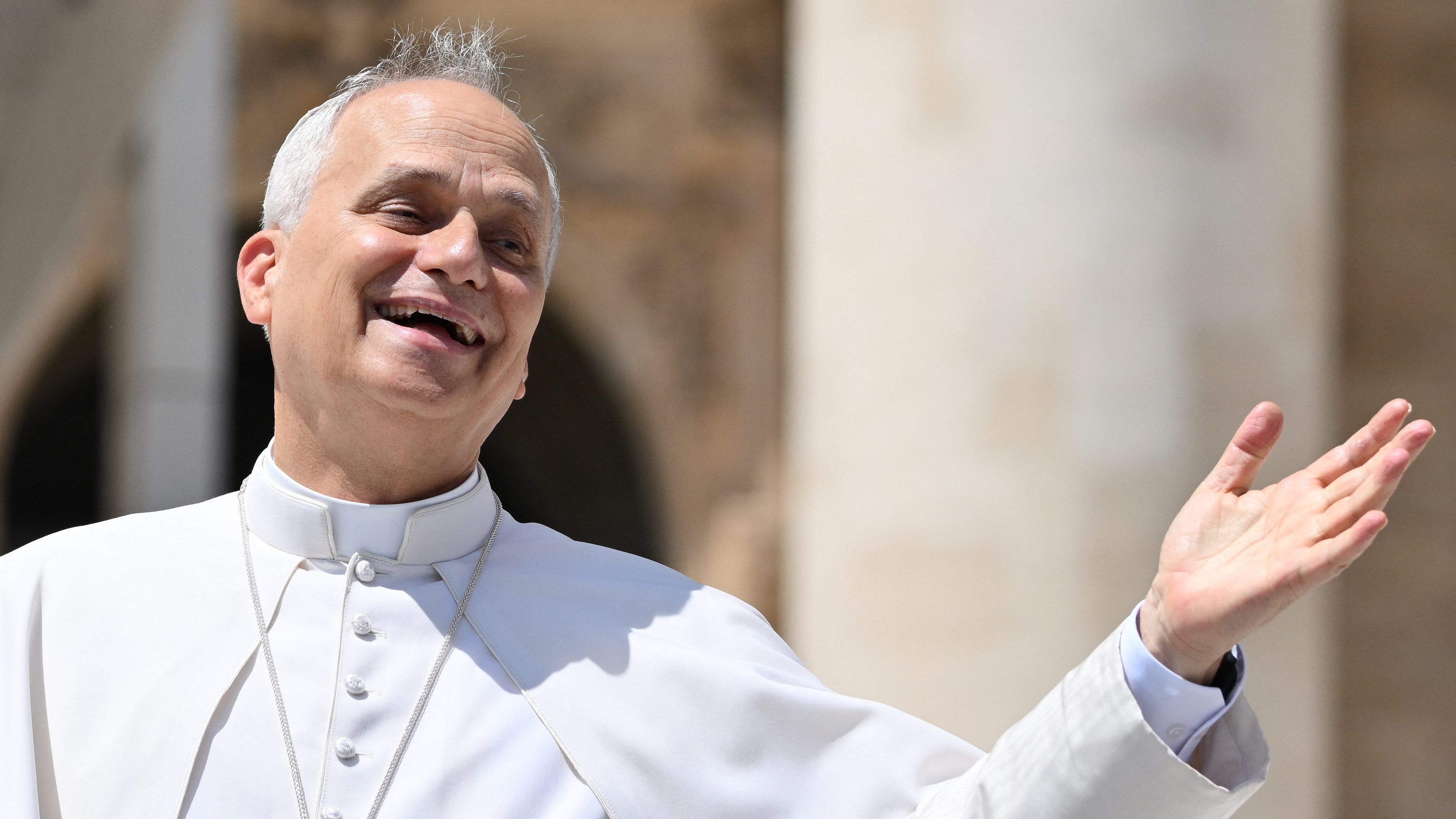 (FILES) Pope Leo XIV reacts at the end of a general audience at St. Peters square in the Vatican on July 30, 2025. On May 8, 2025, Robert Francis Prevost became the first North American pope under the name Leo XIV. In one year, he distinguished himself by a prudent and measured style, a strong social sensitivity and a firm desire to unify the Church. (Photo by Alberto PIZZOLI / AFP)