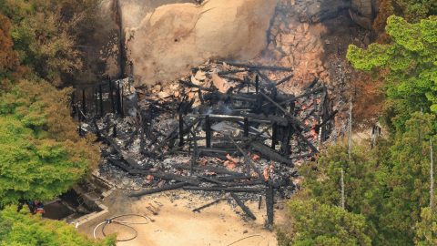 An aerial photo shows the Reikado Hall completely destroyed by fire at Miyajima Misen Daisho-in temple in Itsukushima Island, Miyajima Town, Hatsukaichi City, Hiroshima Prefecture, Japan on May 20, 2026. At the Reikado Hall (Hall of the Eternal Flame) of Daisho-in Temple, there was "eternal flame" that is said to have been burning for over 1200 years. The Reikado Hall was destroyed by fire in 2005 and rebuilt in 2006. The forest on Mount Misen where the Reikado Hall is located, along with the Itsukushima Shrine, is registered as a UNESCO World Heritage Site. ( The Yomiuri Shimbun ) (Photo by Makoto Kondo / The Yomiuri Shimbun via AFP)