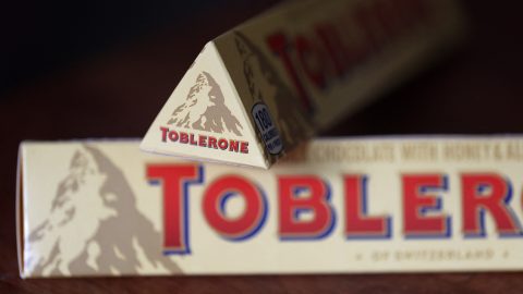 SAN ANSELMO, CALIFORNIA - MARCH 07: In this photo illustration, a Toblerone chocolate bar is displayed on March 07, 2023 in San Anselmo, California. Toblerone will drop the image of the Matterhorn Mountain from their packaging over rules in the Swissness legislation of 2017 that requires businesses to show how their products are sufficiently Swiss in order to use national symbols of Switzerland. (Photo Illustration by Justin Sullivan/Getty Images) (Photo by JUSTIN SULLIVAN / GETTY IMAGES NORTH AMERICA / Getty Images via AFP)