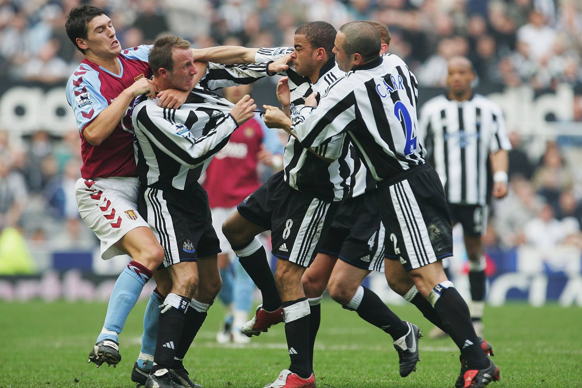 NEWCASTLE, ENGLAND - APRIL 2 : Lee Bowyer and Kieron Dyer of Newcastle come to blows during the FA Barclays Premiership match between Newcastle United and Aston Villa at St James Park on April 2, 2005 in Newcastle, England. (Photo by Laurence Griffiths/Getty Images)