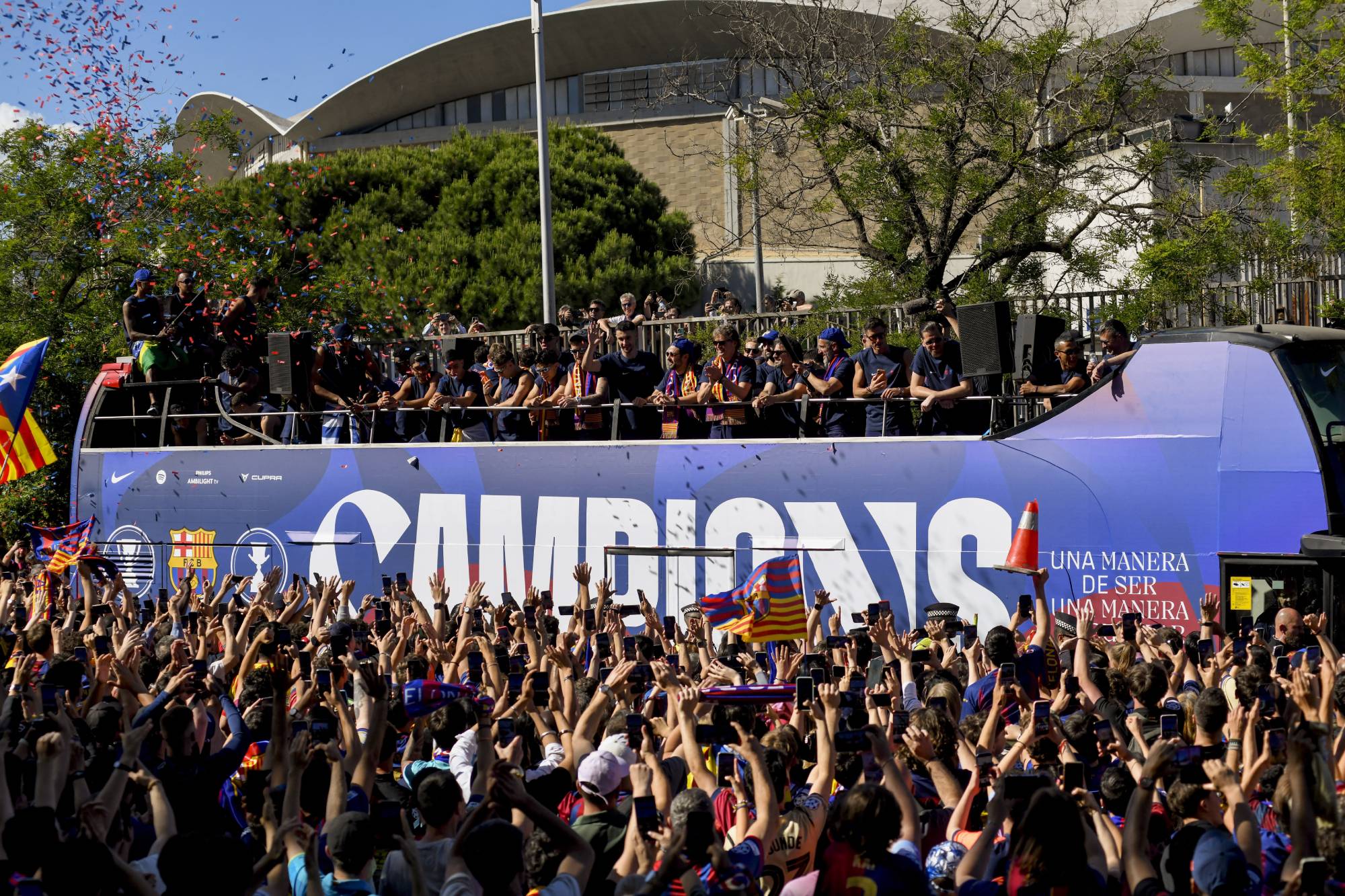 BARCELONA, SPAIN - MAY 11: Players of FC Barcelona celebrate winning the 2025/26 LaLiga and Supercopa de Espana titles with supporters in the streets of Barcelona, Spain, on May 11, 2026. Adria Puig / Anadolu (Photo by Adria Puig / Anadolu via AFP)