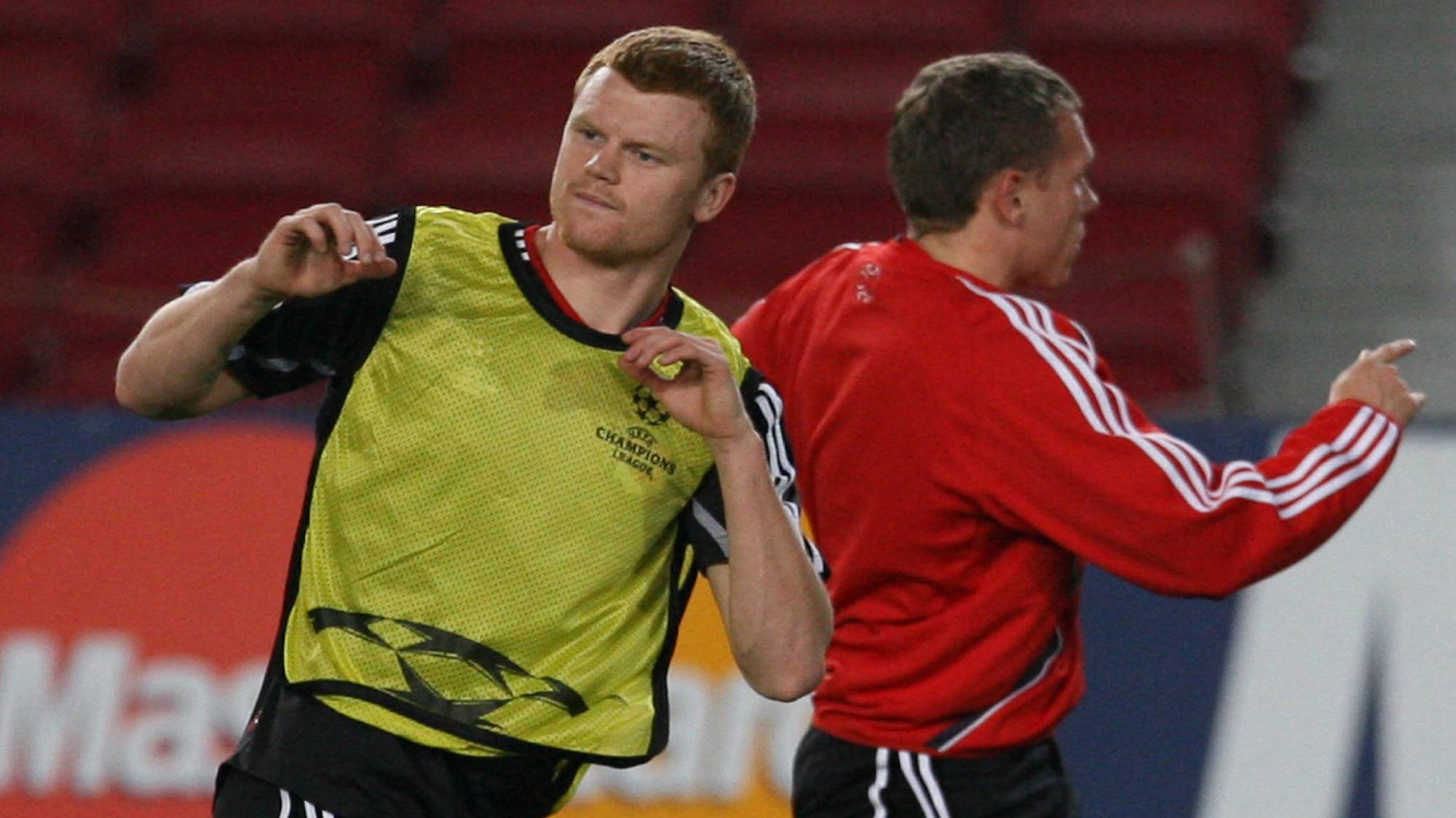 Liverpool's John Arne Riise (L) and Craig Bellamy take part in a training session at the Camp Nou stadium in Barcelona, 20 February 2007. Current champions Barcelona take on the previous holders Liverpool in a Champions League football match on Wednesday. AFP PHOTO/PAUL ELLIS