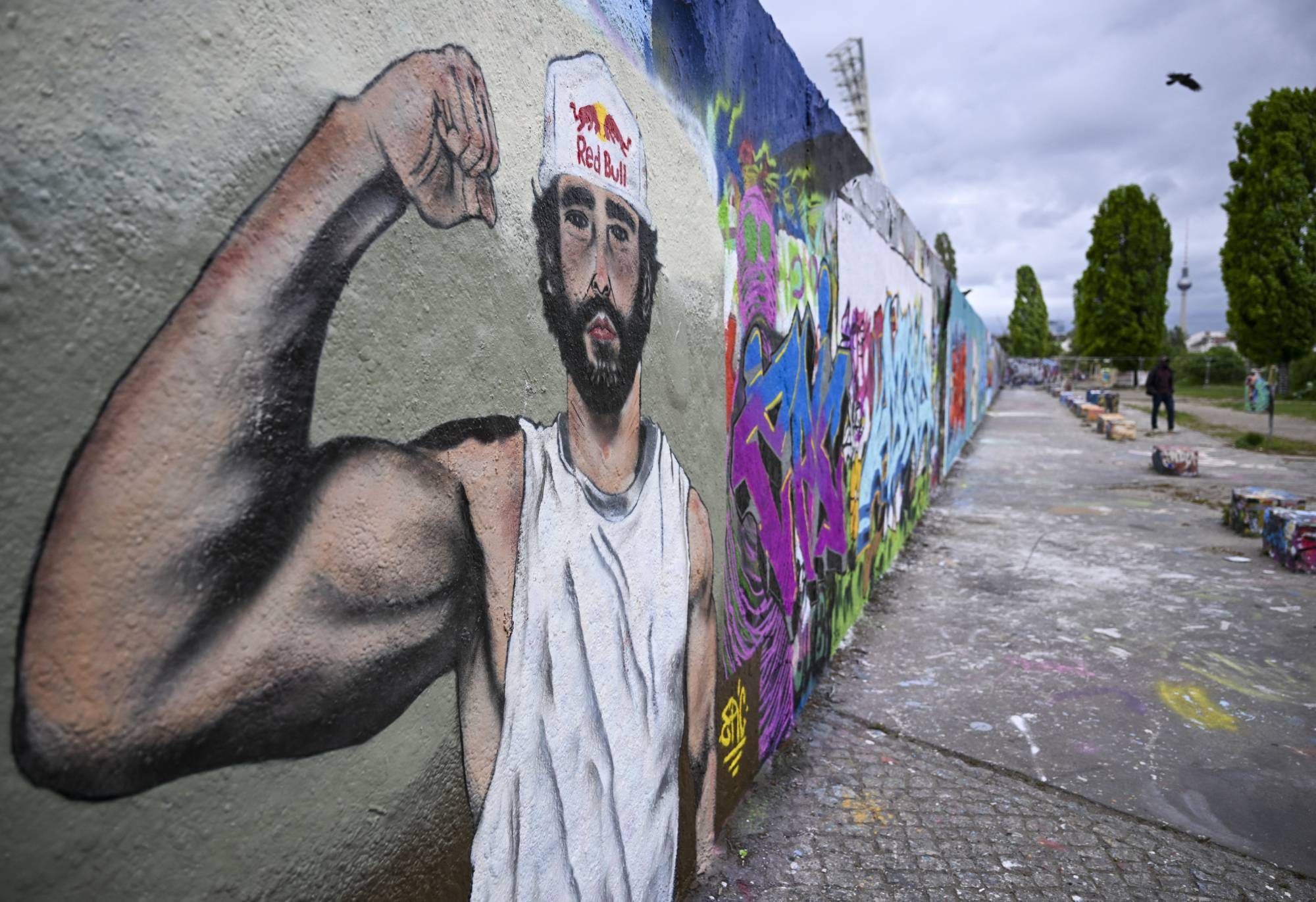 BERLIN, GERMANY - MAY 11: A graffiti artwork dedicated to Red Bull athlete Arda Saatci is displayed at Mauerpark in Berlin, Germany, on May 11, 2026. Saatci completed a 600-kilometer ultra marathon from Death Valley National Park in California, United States, to Santa Monica Pier in 123 hours, 21 minutes and 10 seconds. Halil Sagirkaya / Anadolu (Photo by HALIL SAGIRKAYA / Anadolu via AFP)