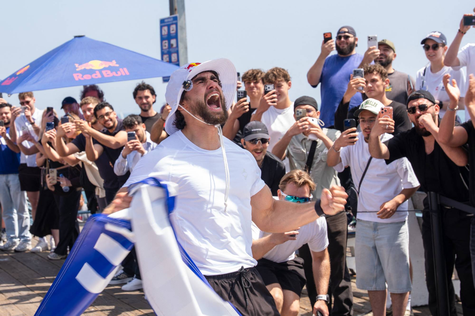 German ultrarunner Arda Saatçi completed a 604.6 km run from Death Valley to Santa Monica in 123 hours, overcoming extreme heat, sleep deprivation and nearly 6,000 metres of elevation gain during his latest Cyborg Season challenge. Millions followed the livestreamed endurance feat as Saatçi battled dehydration and hallucinations before reaching Santa Monica Pier. // Red Bull athlete Arda Saatçi is emotional as he completes the 2026 Red Bull Cyborg Season Ultra 600 in Santa Monica, CA, USA on May 10, 2026. // Cameron Moon / Red Bull Content Pool (Photo by Cameron Moon / Red Bull Content Pool via AFP)