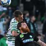 Toon Raemaekers, a Ferencváros (b) és Ádám Martin, a Paks játékosa a labdarúgó Fizz Liga 31. fordulójában játszott Ferencvárosi TC - Paksi FC mérkőzésen a Groupama Arénában.