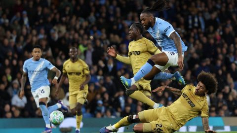 Manchester City's Ghanaian midfielder #42 Antoine Semenyo jumps a challenge from Crystal Palace's US defender #26 Chris Richards during the English Premier League football match between Manchester City and Crystal Palace at the Etihad Stadium in Manchester, north west England, on May 13, 2026.