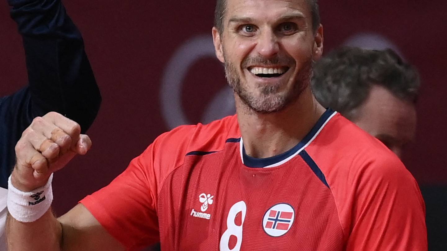 Norway's right winger Kristian Bjornsen (L) and Norway's pivot Bjarthe Myrhol celebrate after scoring during the men's preliminary round group A handball match between Norway and France of the Tokyo 2020 Olympic Games at the Yoyogi National Stadium in Tokyo on August 1, 2021.